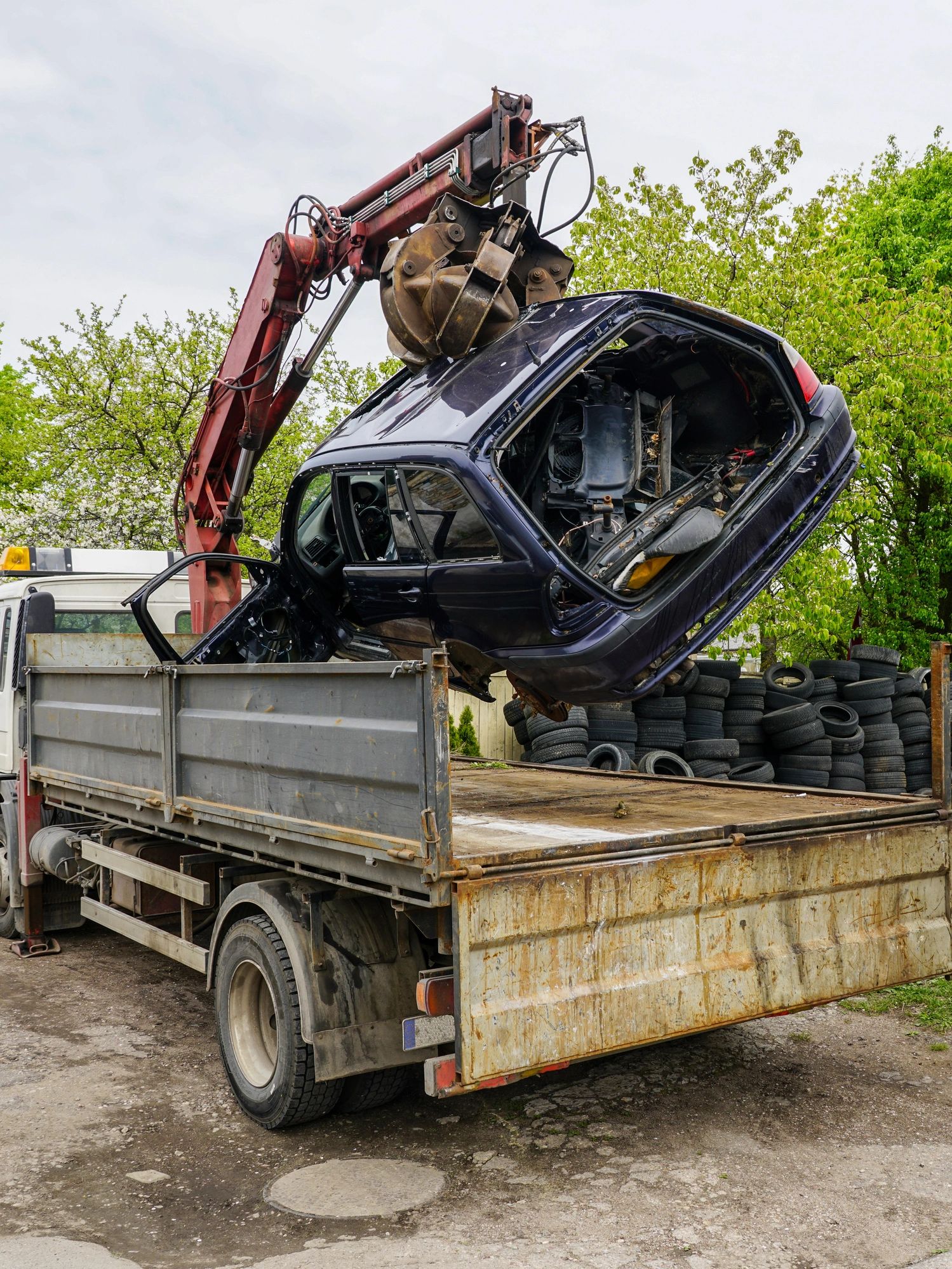 Car being towed away for recycling