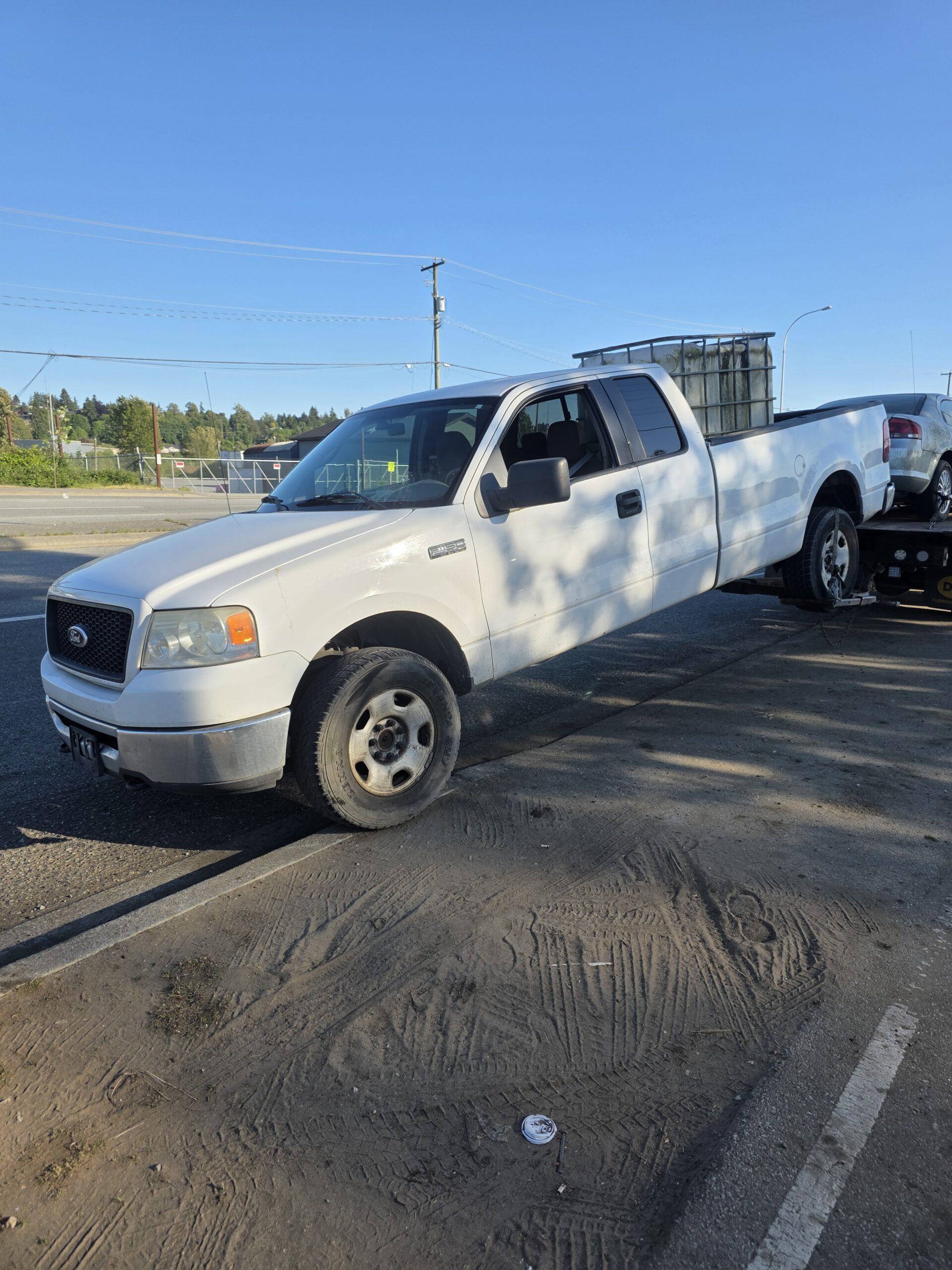 White pickup truck purchased by local used car buyers in Coquitlam